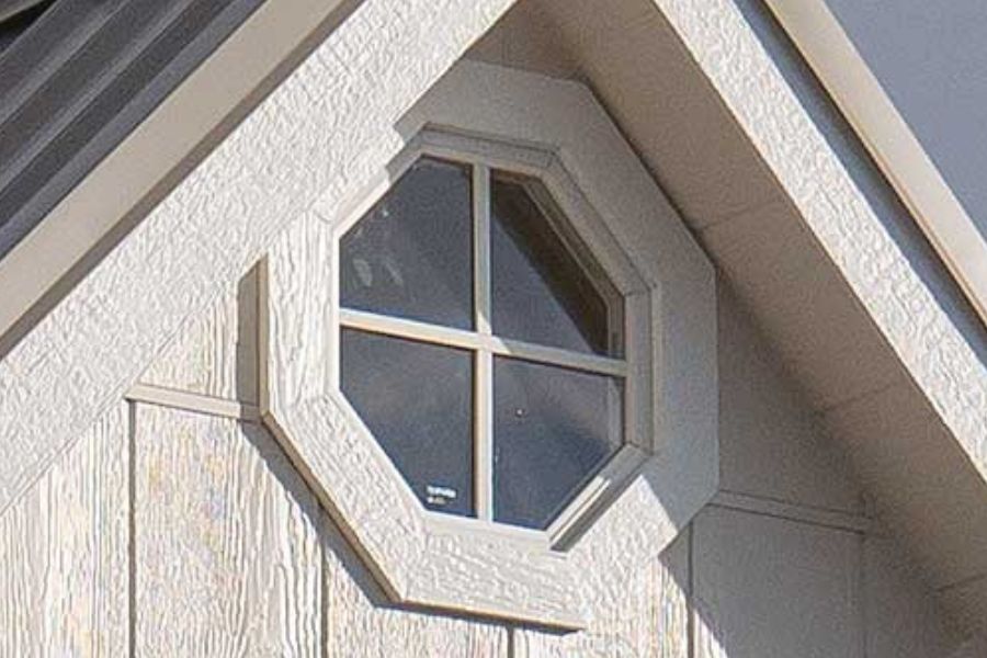 white octagon shaped single pane window